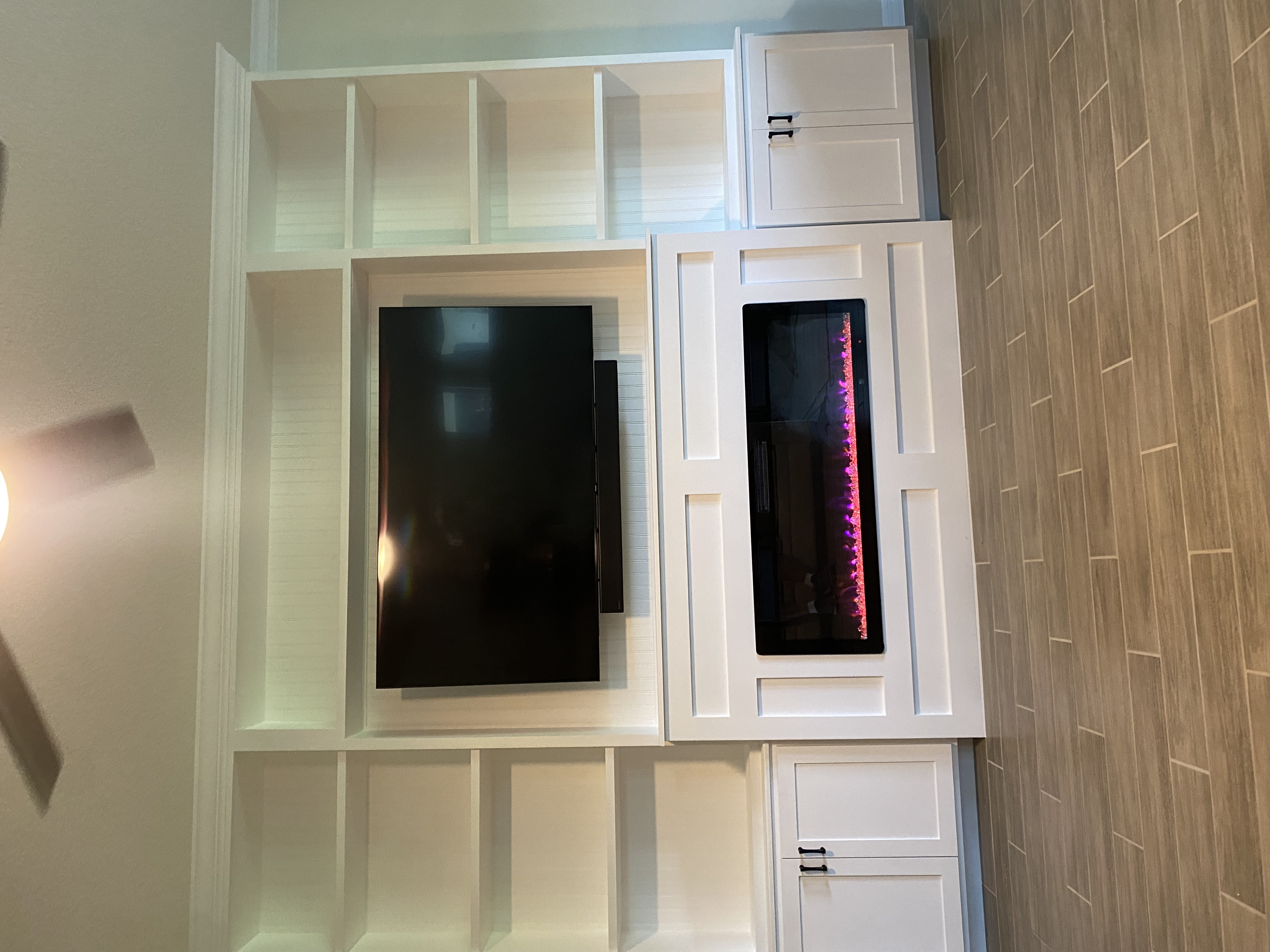 Custom built-in shelving and TV installation in Clermont FL
