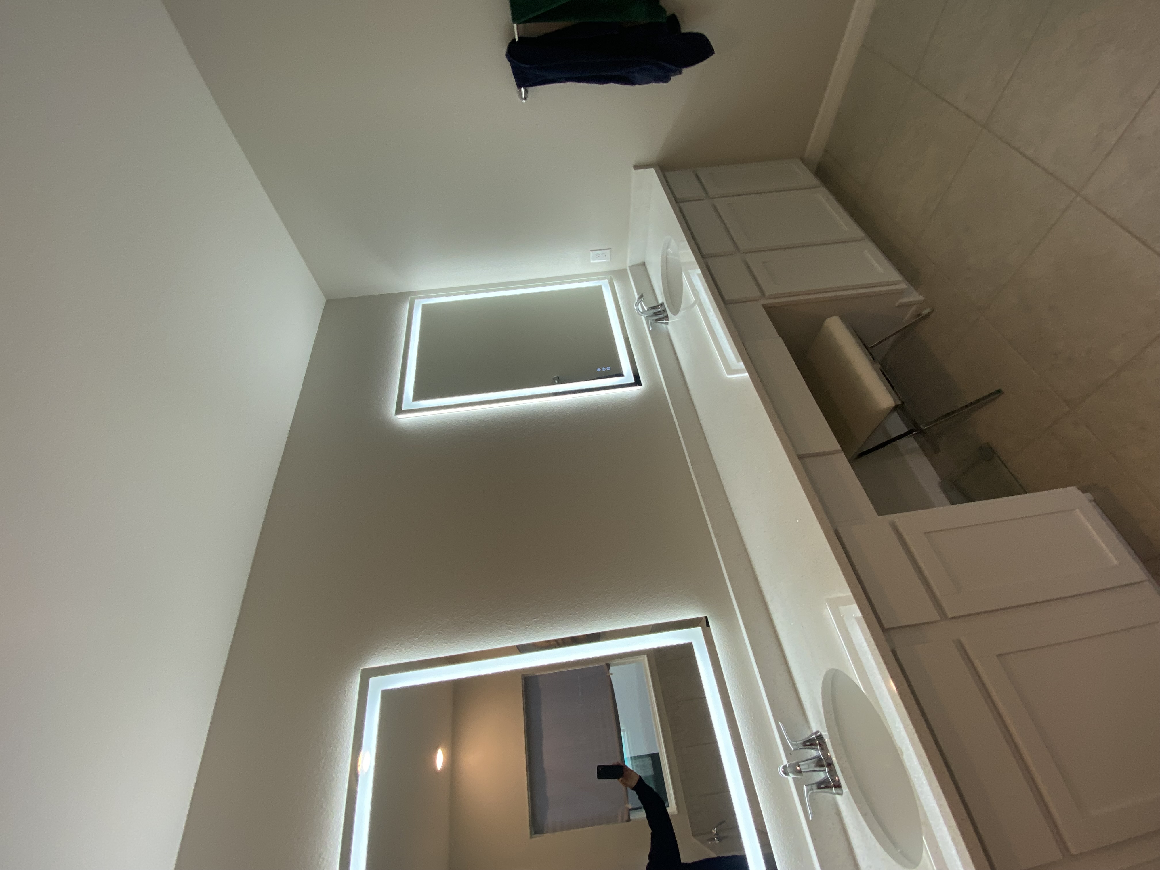 Bathroom LED mirror and lighting installation in Clermont FL